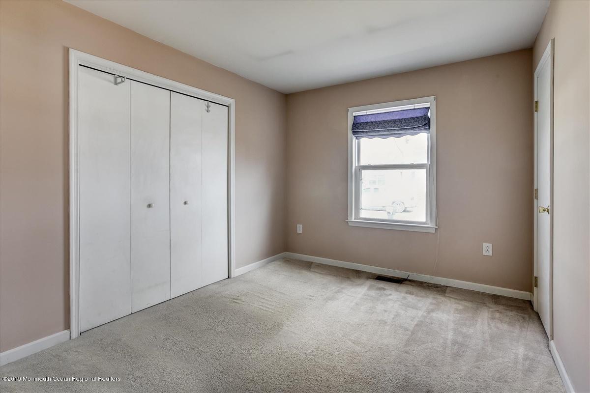 6 Bash Road Toms River, NJ 08753 - Photo 11 of 19 a view of an empty room with a window