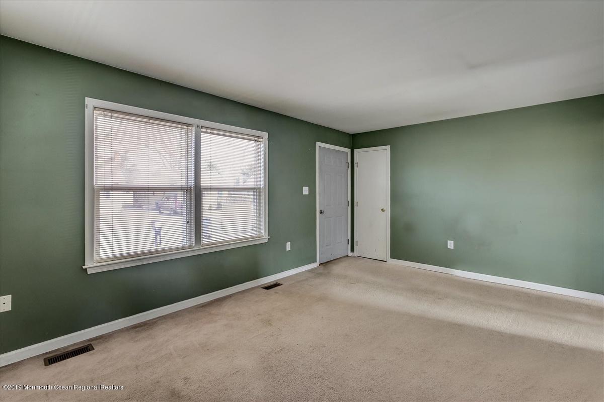 6 Bash Road Toms River, NJ 08753 - Photo 5 of 19 a view of an empty room with a window