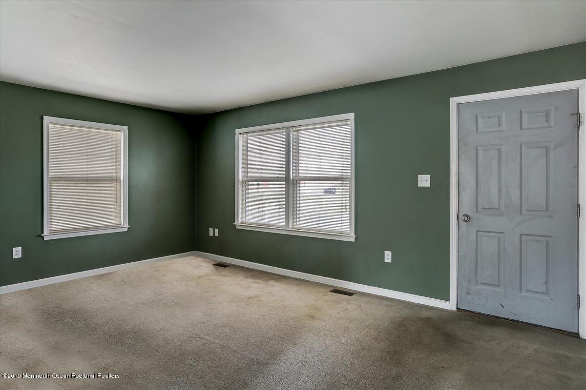 6 Bash Road Toms River, NJ 08753 - Photo 6 of 19 a view of an empty room with a window