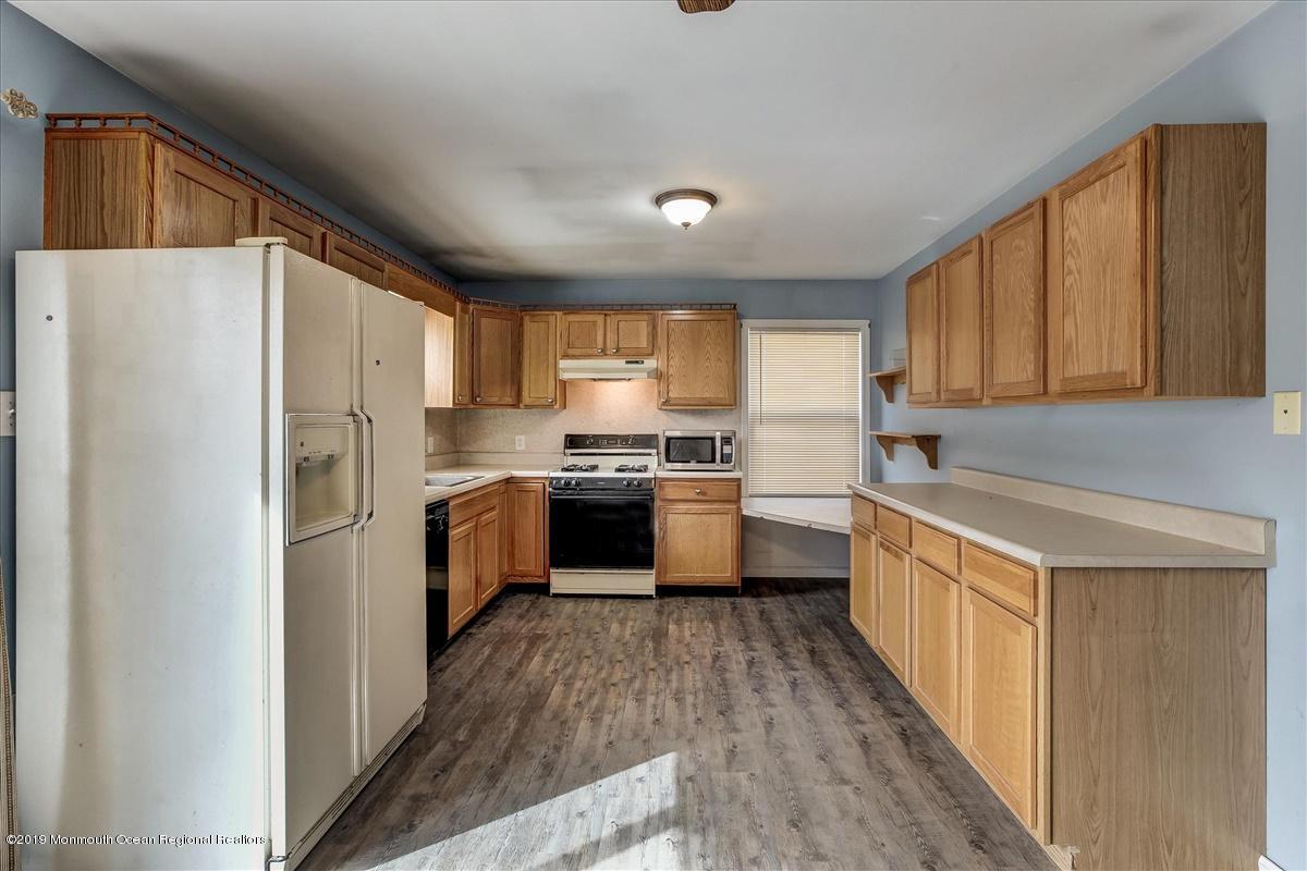 6 Bash Road Toms River, NJ 08753 - Photo 8 of 19 a kitchen with a refrigerator a sink and dishwasher