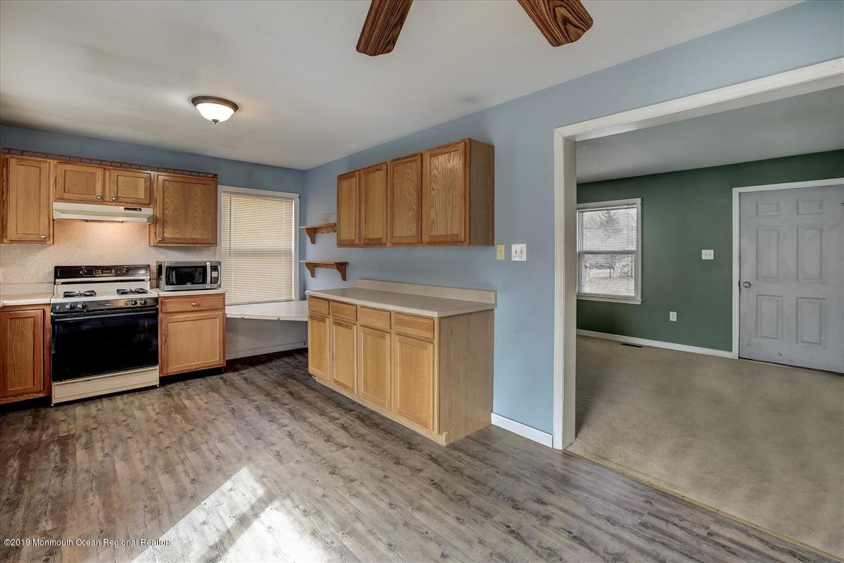 6 Bash Road Toms River, NJ 08753 - Photo 19 of 19 a kitchen with a sink and a stove top oven