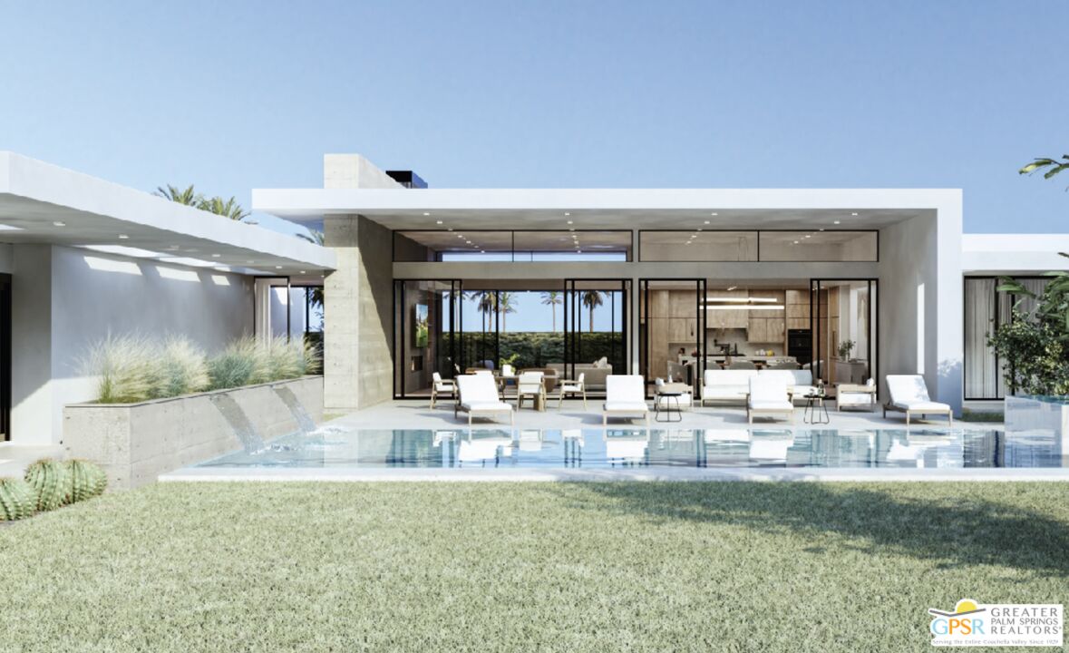 a view of a living room and chandelier