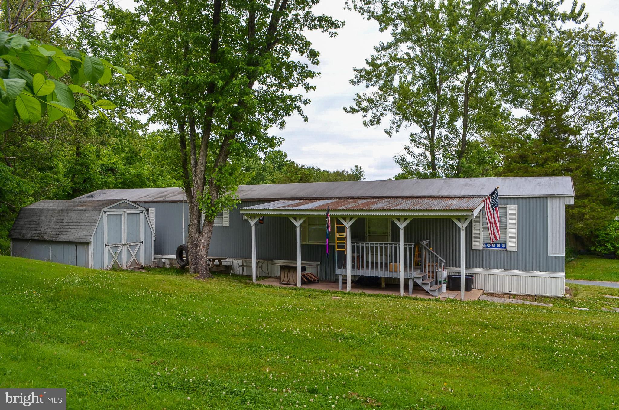 2001 Red Bank Road Dover, PA 17315 - Photo 3 of 19 a view of a house that has a garden