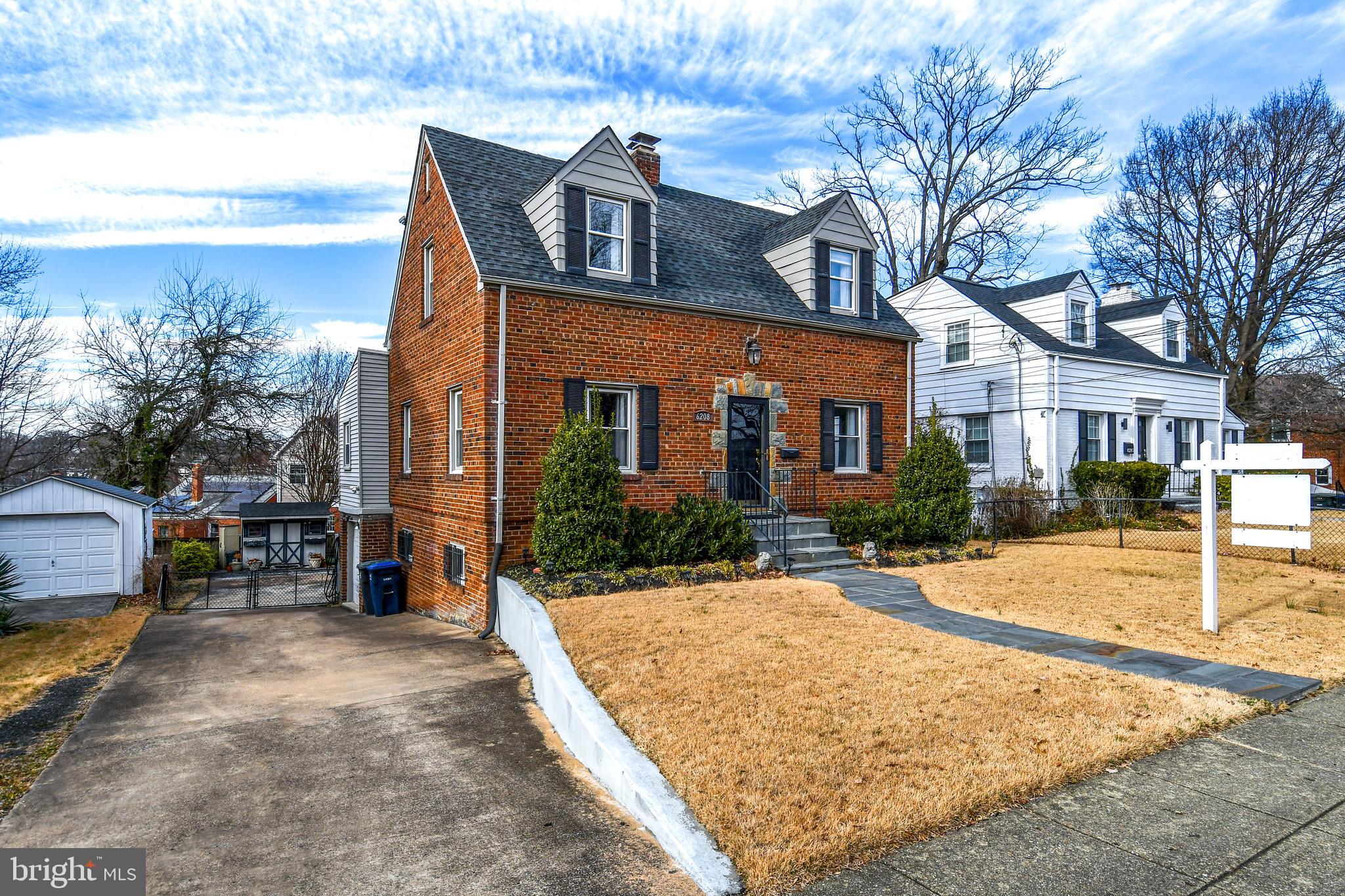 6208 Sligo Mill Road Northeast Washington, DC 20011 - Photo 2 of 50 a view of a house with a patio