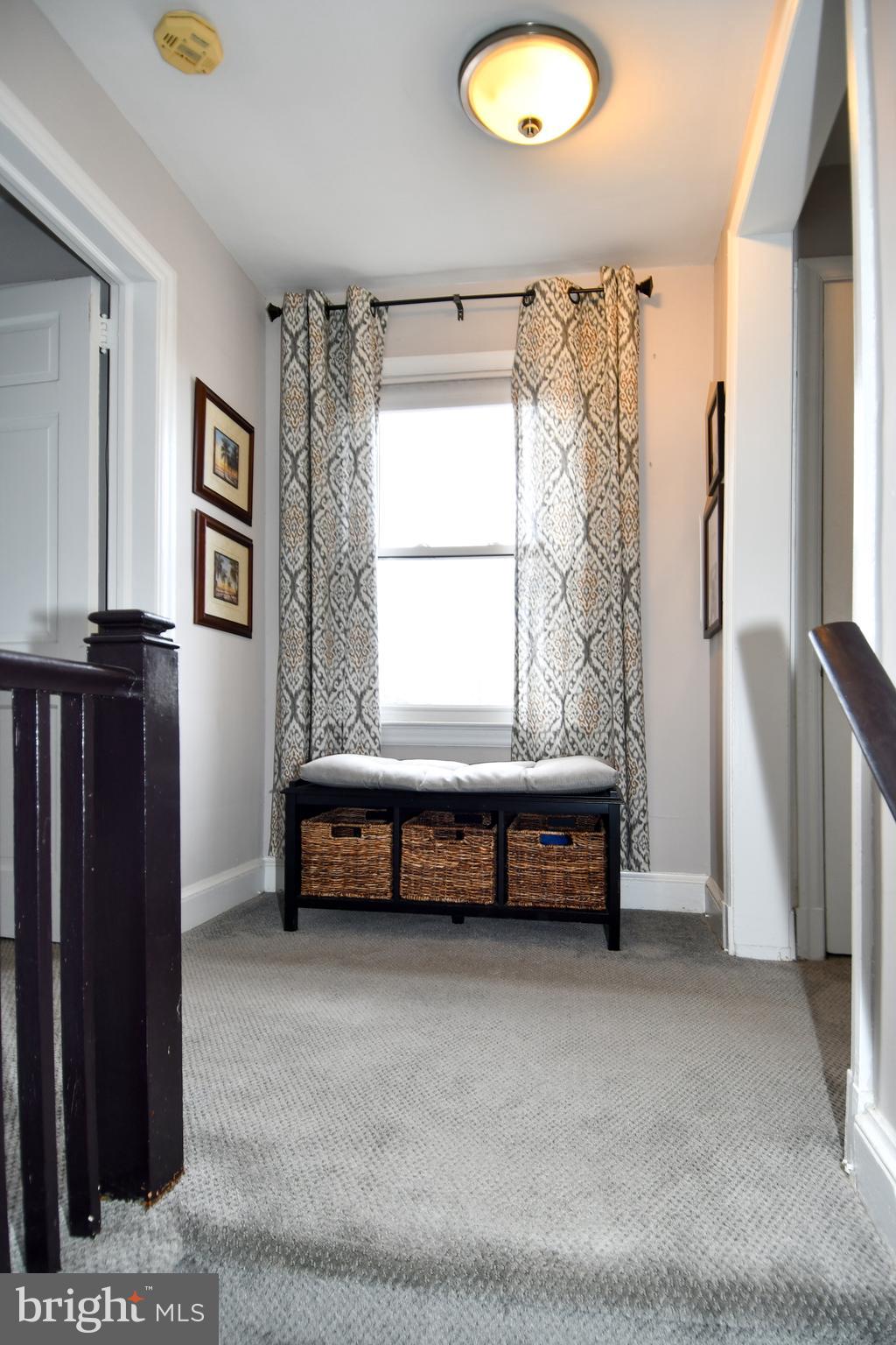 6208 Sligo Mill Road Northeast Washington, DC 20011 - Photo 26 of 50 a bedroom with a bed and a window