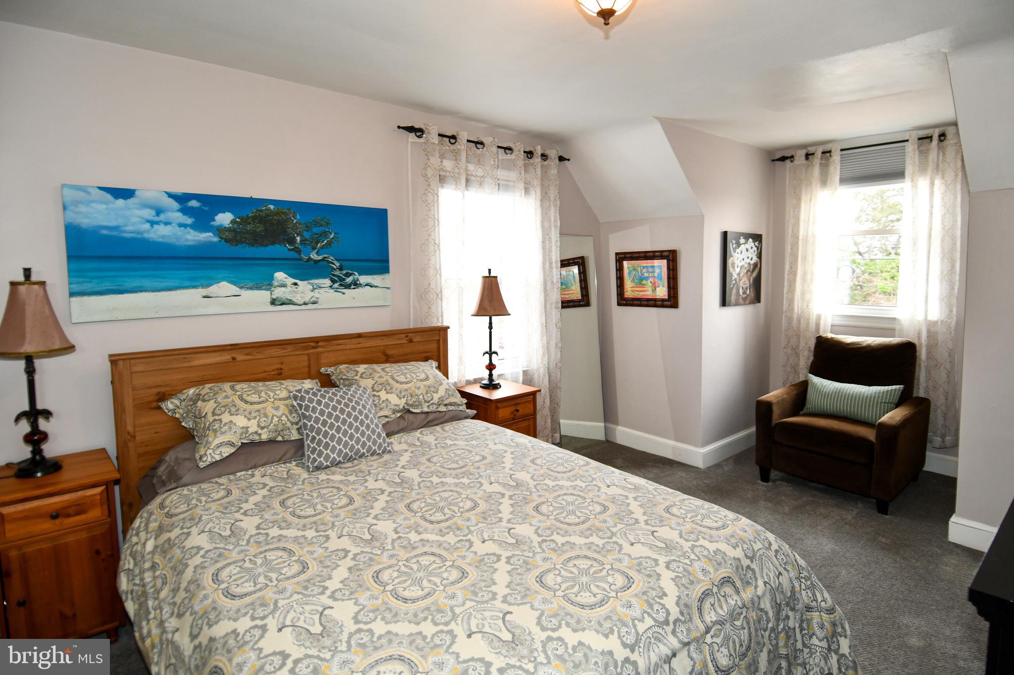 6208 Sligo Mill Road Northeast Washington, DC 20011 - Photo 30 of 50 a bedroom with a bed and a couch