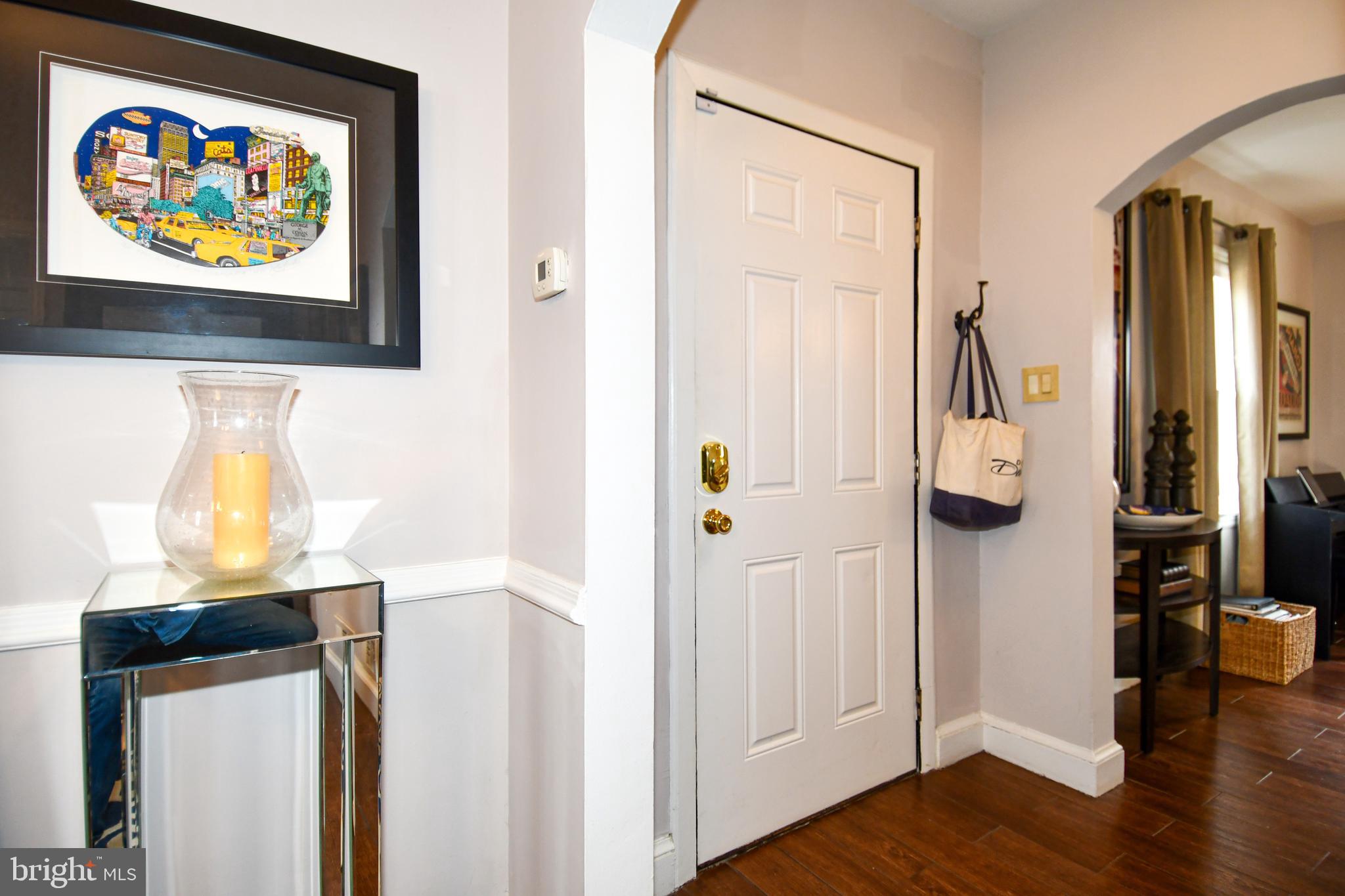 6208 Sligo Mill Road Northeast Washington, DC 20011 - Photo 3 of 50 a view of an entryway with wooden floor