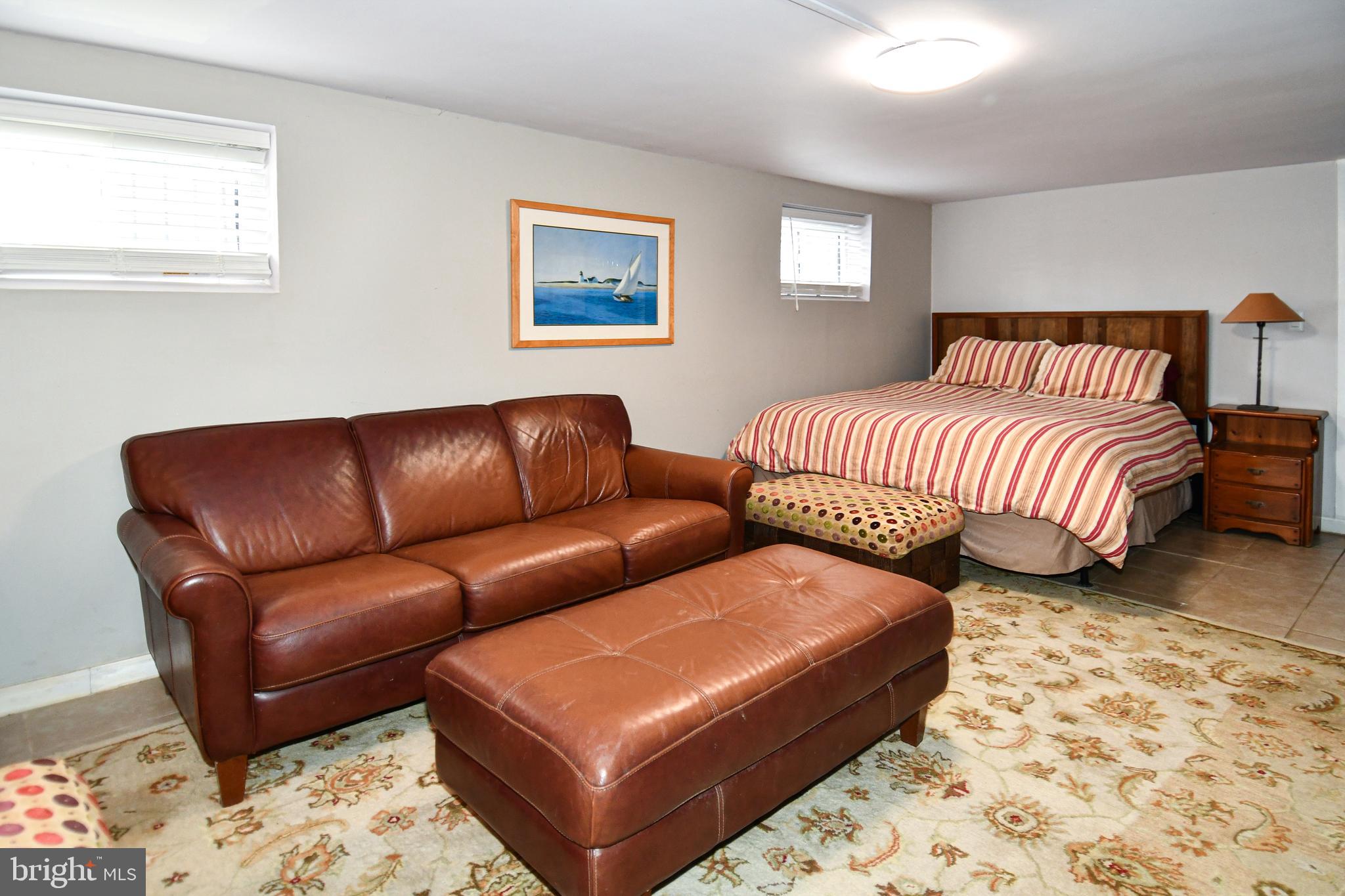 6208 Sligo Mill Road Northeast Washington, DC 20011 - Photo 34 of 50 a bedroom with furniture and a window