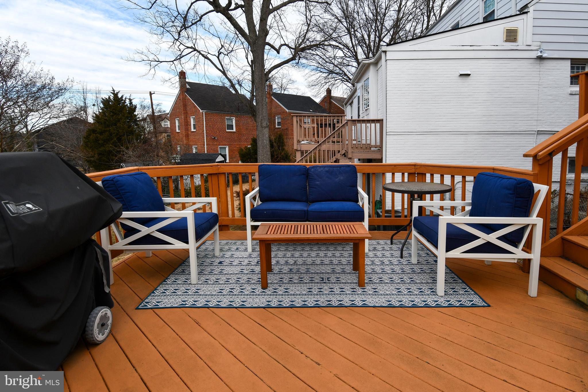 6208 Sligo Mill Road Northeast Washington, DC 20011 - Photo 44 of 50 a view of a chairs and tables on the roof deck