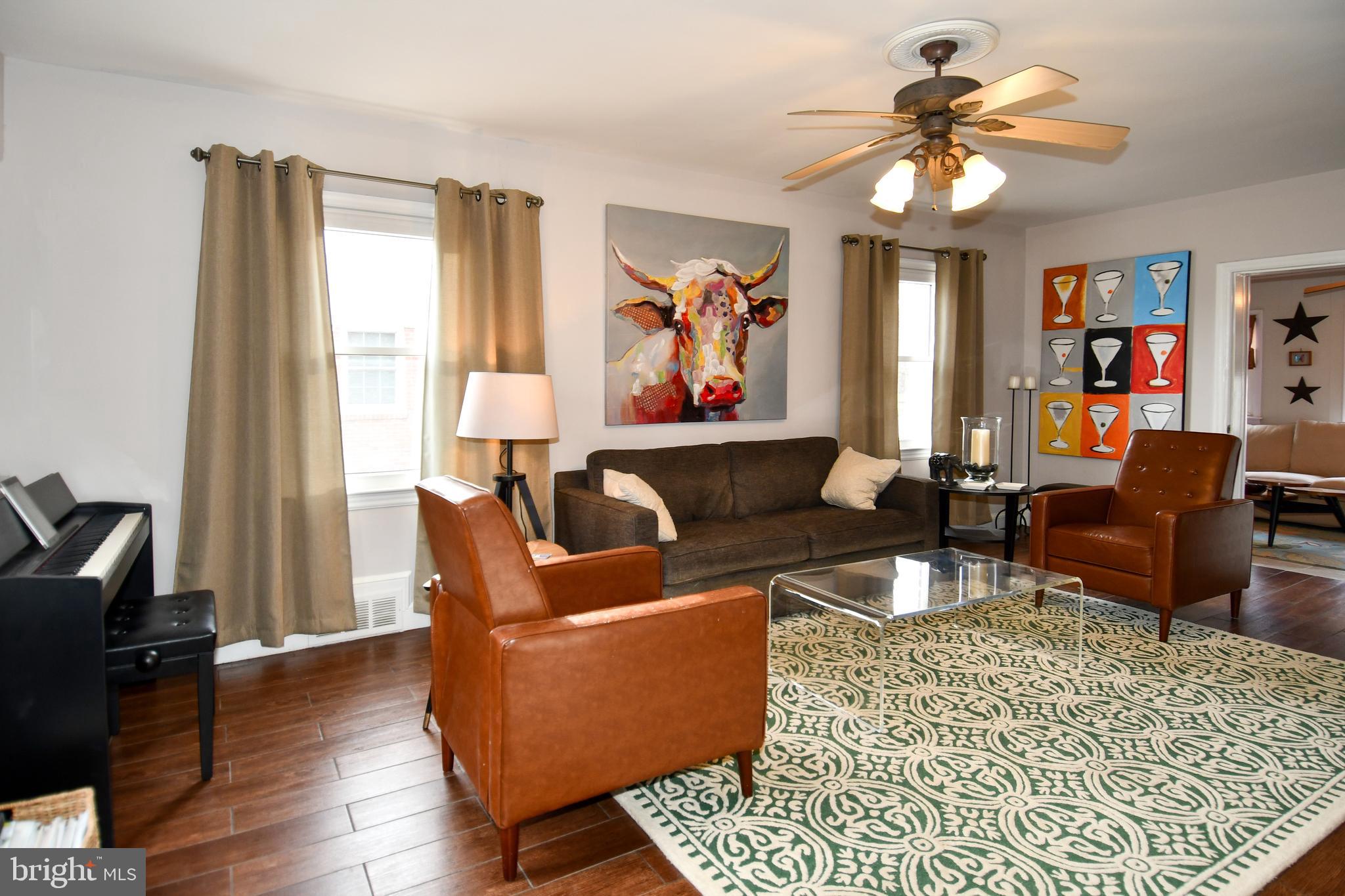 6208 Sligo Mill Road Northeast Washington, DC 20011 - Photo 5 of 50 a living room with furniture and a window