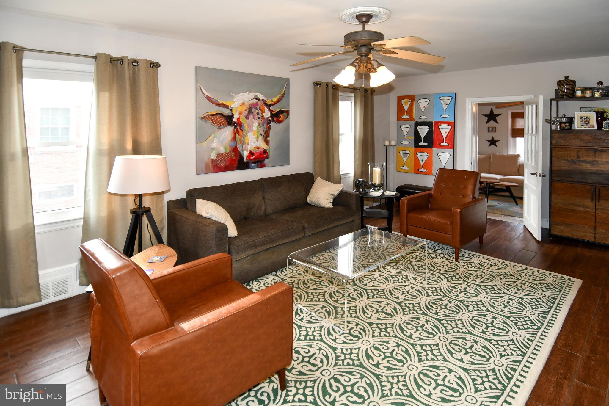 6208 Sligo Mill Road Northeast Washington, DC 20011 - Photo 6 of 50 a living room with furniture and a rug