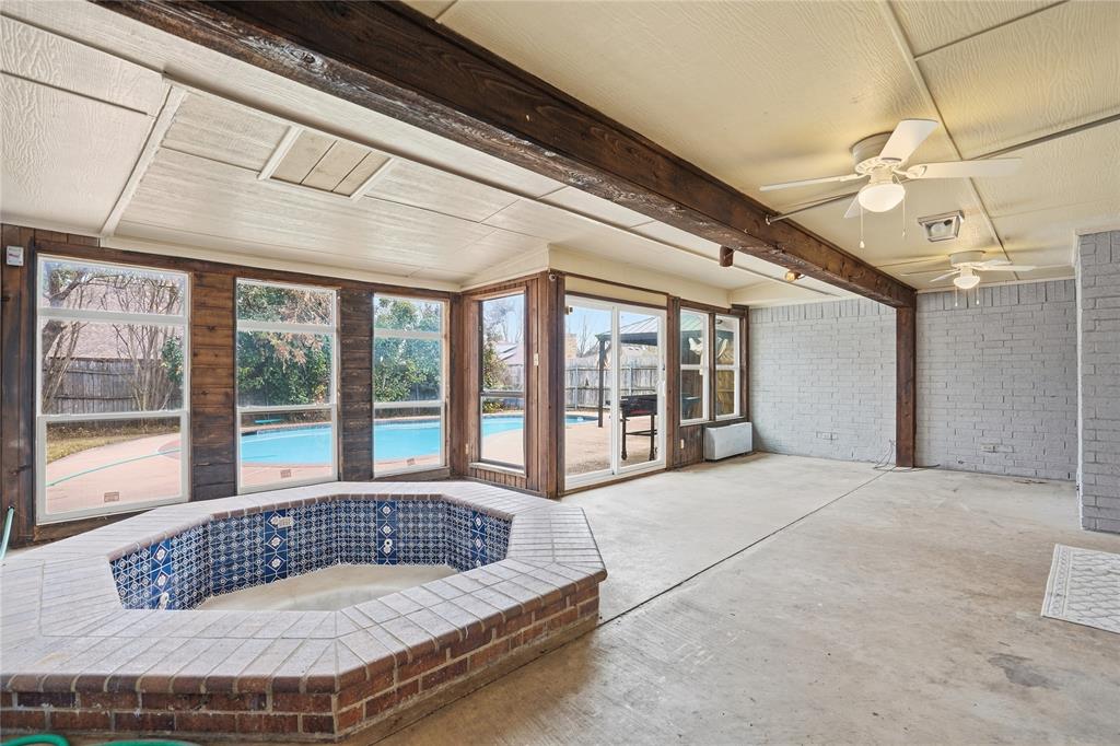 4612 Applewood Road Fort Worth, TX 76133 - Photo 33 of 39 Sunroom featuring a hot tub and beamed ceiling