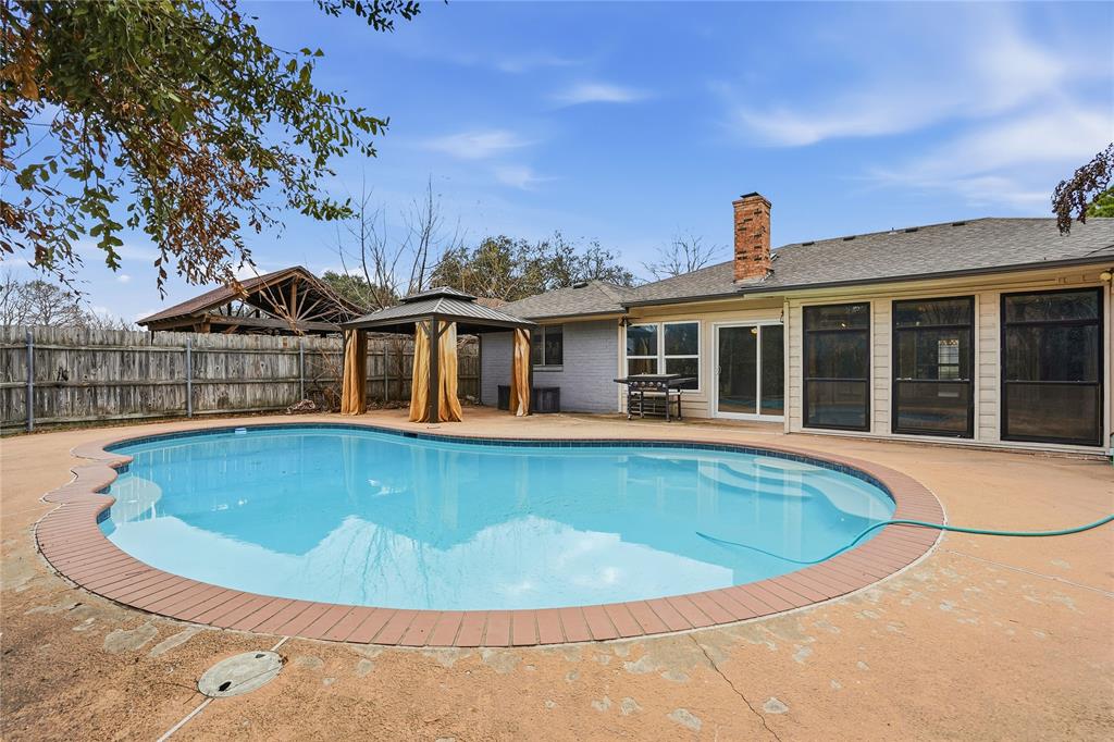 4612 Applewood Road Fort Worth, TX 76133 - Photo 38 of 39 View of swimming pool featuring a gazebo, a patio area, and a fenced backyard