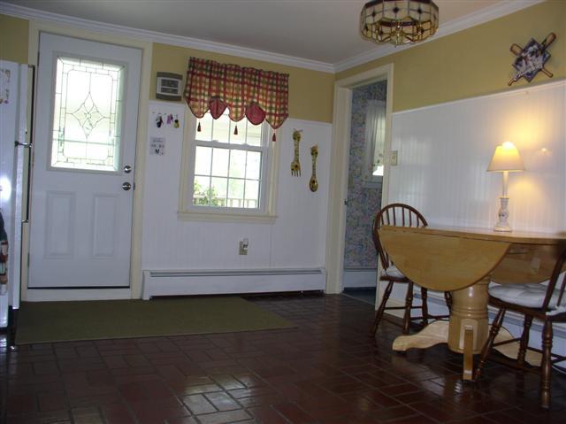 493 Main Road Stamford, VT 05352 - Photo 8 of 24 a view of a livingroom with furniture and window
