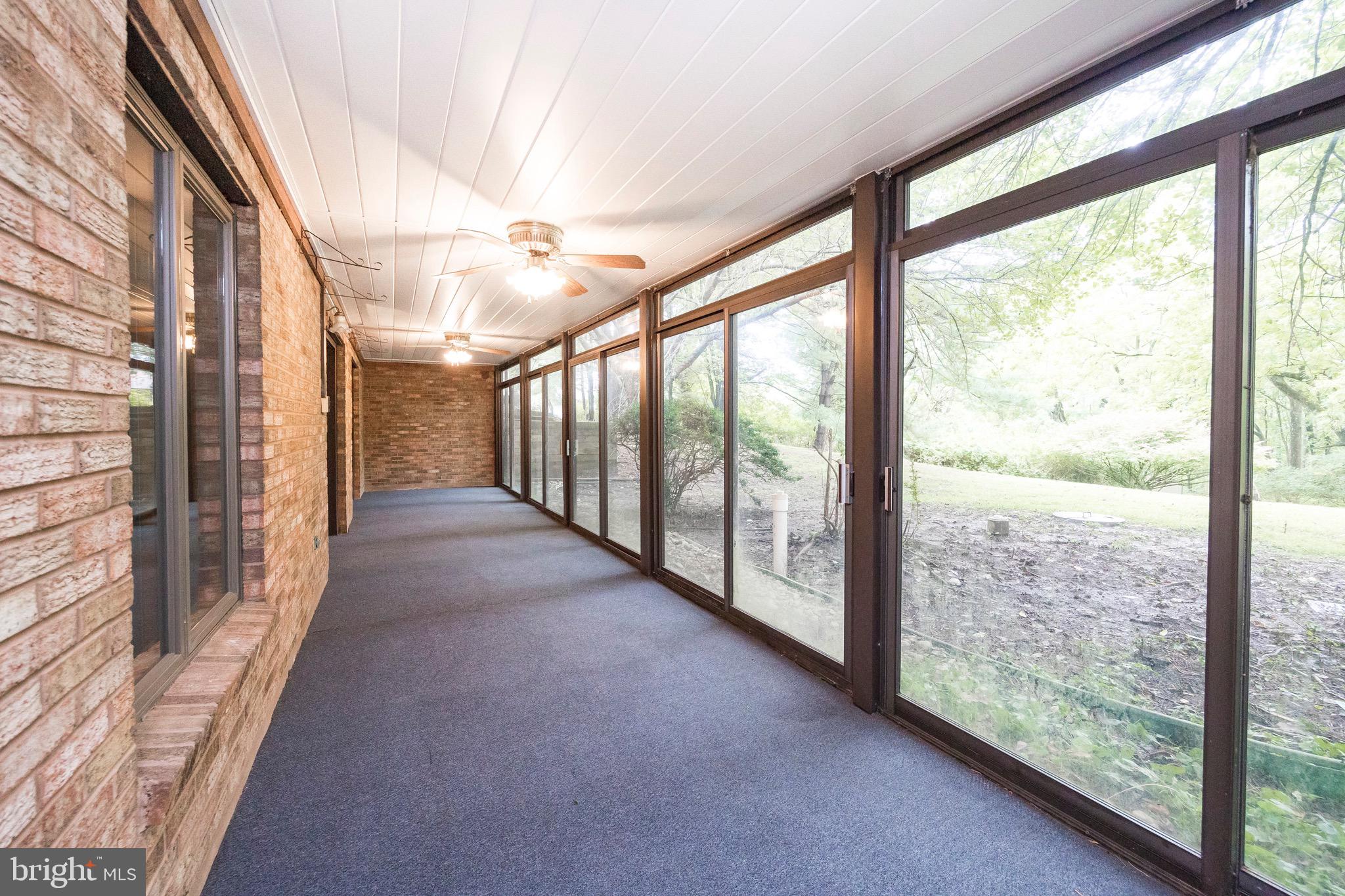 4 Hilltop Road Kennett Square, PA 19348 - Photo 28 of 40 Florida Room Length of the House Heated Lower Leve