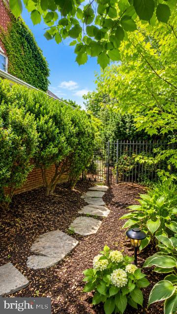 241 Edwards Ferry Road Northeast Leesburg, VA 20176 - Photo 37 of 41 Charming garden path to tranquility.