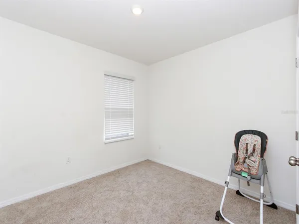 a room with a table and a chair