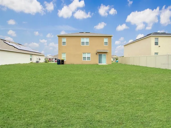 a view of a big room with windows and cabinet
