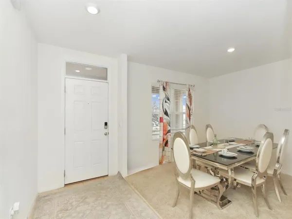 a view of a dining room with furniture