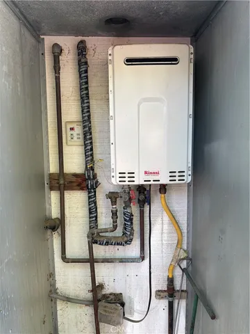 a living room with lots of books and baby