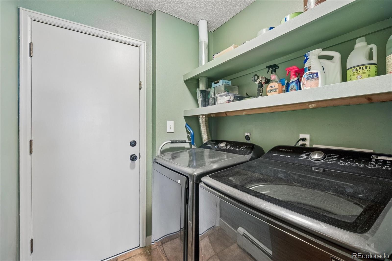 4654 South Union Street Morrison, CO 80465 - Photo 28 of 34 a utility room with washer and dryer