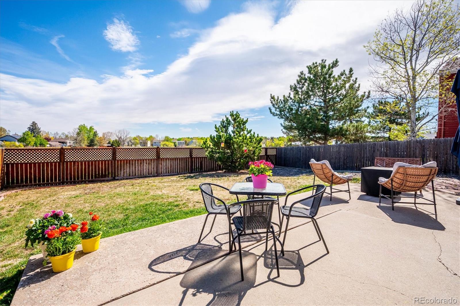 4654 South Union Street Morrison, CO 80465 - Photo 29 of 34 a view of a backyard with furniture and a garden
