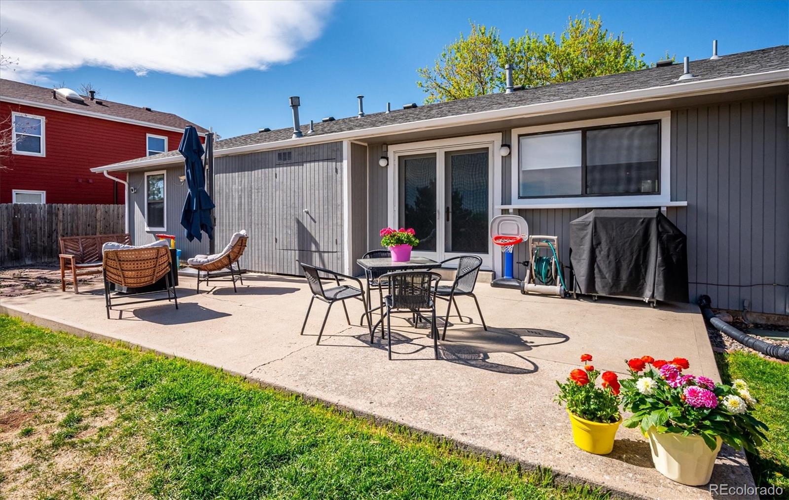 4654 South Union Street Morrison, CO 80465 - Photo 30 of 34 a view of a backyard with sitting area and furniture