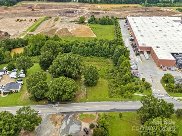 a view of a swimming pool with a yard