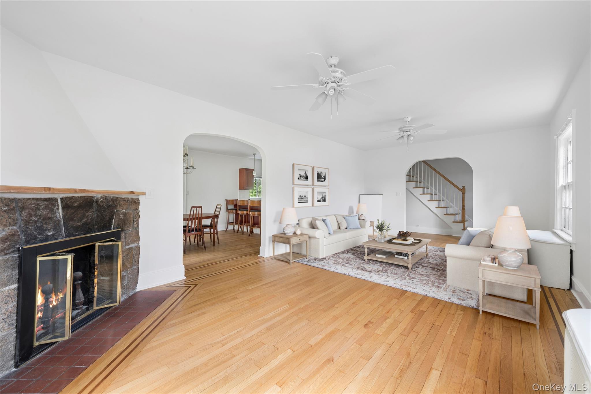 17 Old Orchard Road New Rochelle, NY 10804 - Photo 5 of 32 a living room with furniture and a fireplace