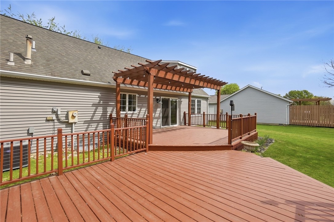 135 Concord Farm Road Englewood, OH 45322 - Photo 40 of 46 This spacious wood deck with a pergola offers ample outdoor entertaining space and serene backyard views.