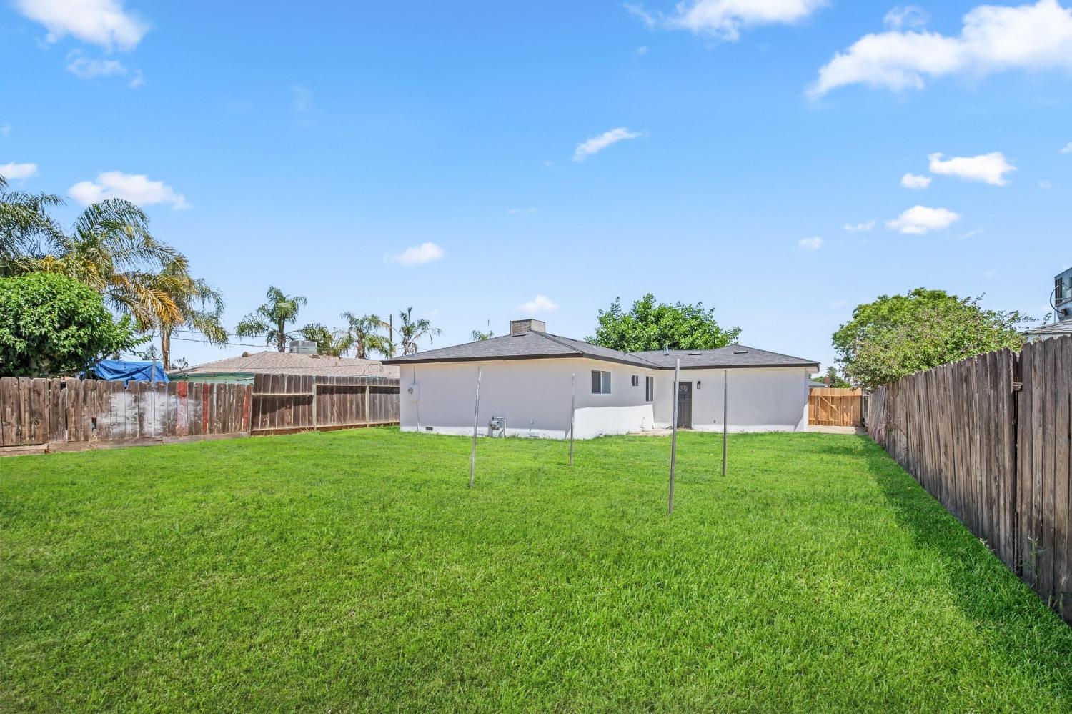 1067 North Haney Avenue Reedley, CA 93654 - Photo 14 of 14 Picture of backyard has grass which was added digitally.