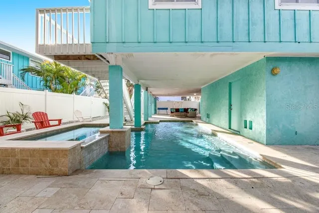 a view of a back yard of the house