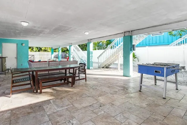 a room with furniture and a large window