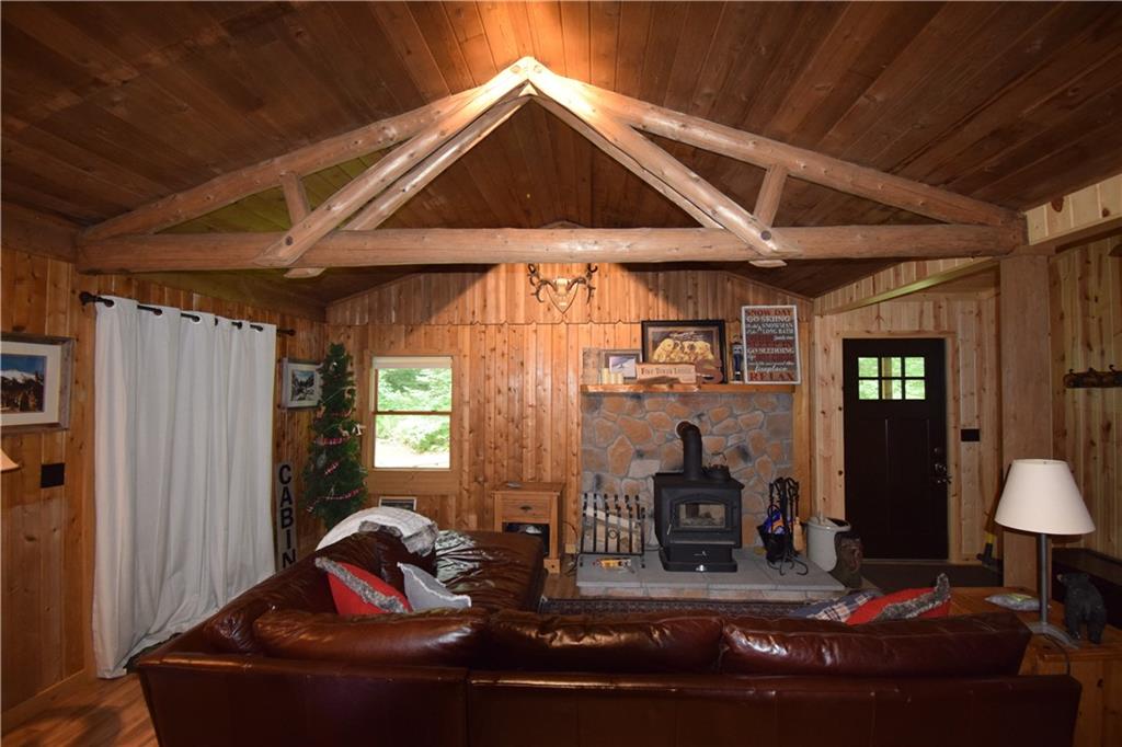 189 Fire Tower Road Champion, PA 15622 - Photo 13 of 25 a room with furniture and wooden floor