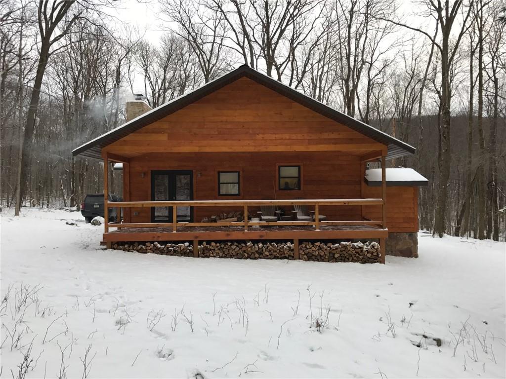 189 Fire Tower Road Champion, PA 15622 - Photo 5 of 25 a view of a house with a snow in the yard