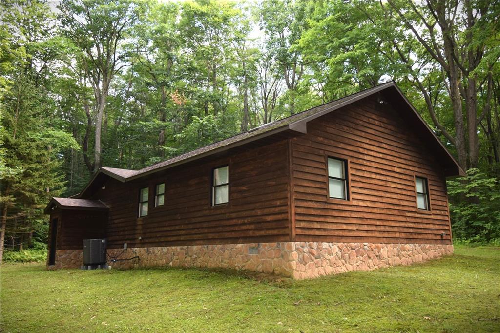 189 Fire Tower Road Champion, PA 15622 - Photo 6 of 25 a front view of a house with a garden