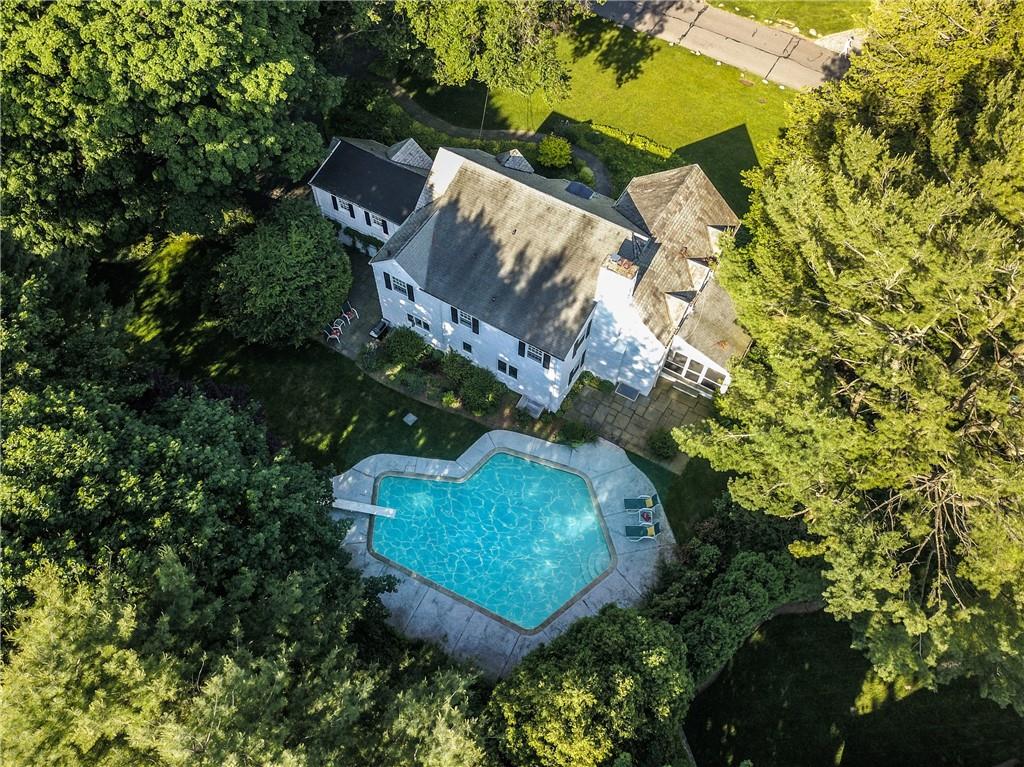 74 Greenhaven Road Rye, NY 10580 - Photo 1 of 1 an aerial view of a house with a yard and garden