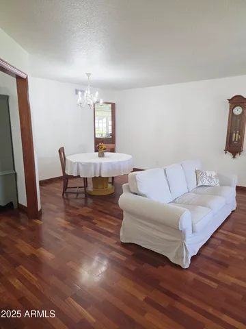 a bathroom with a sink a mirror and a shower