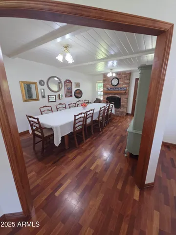 a view of walk in closet with clothes