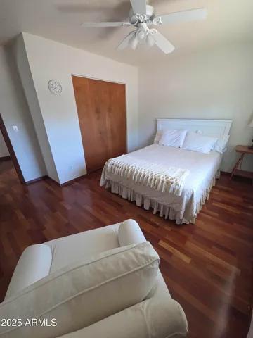 a view of balcony with wooden floor