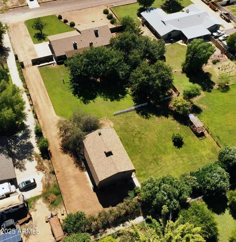a house with trees in the background
