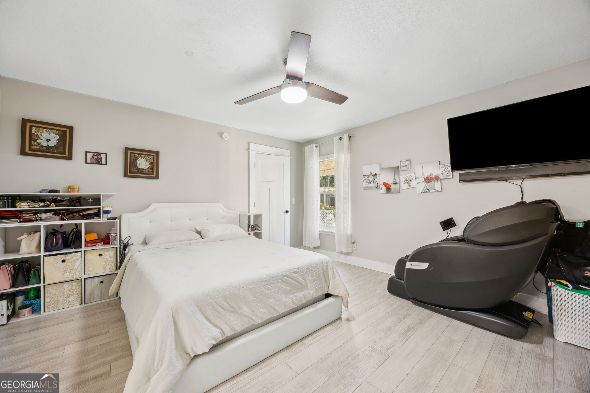 203 Foxwood Circle St. Marys, GA 31558 - Photo 17 of 52 a bedroom with a bed and a flat screen tv