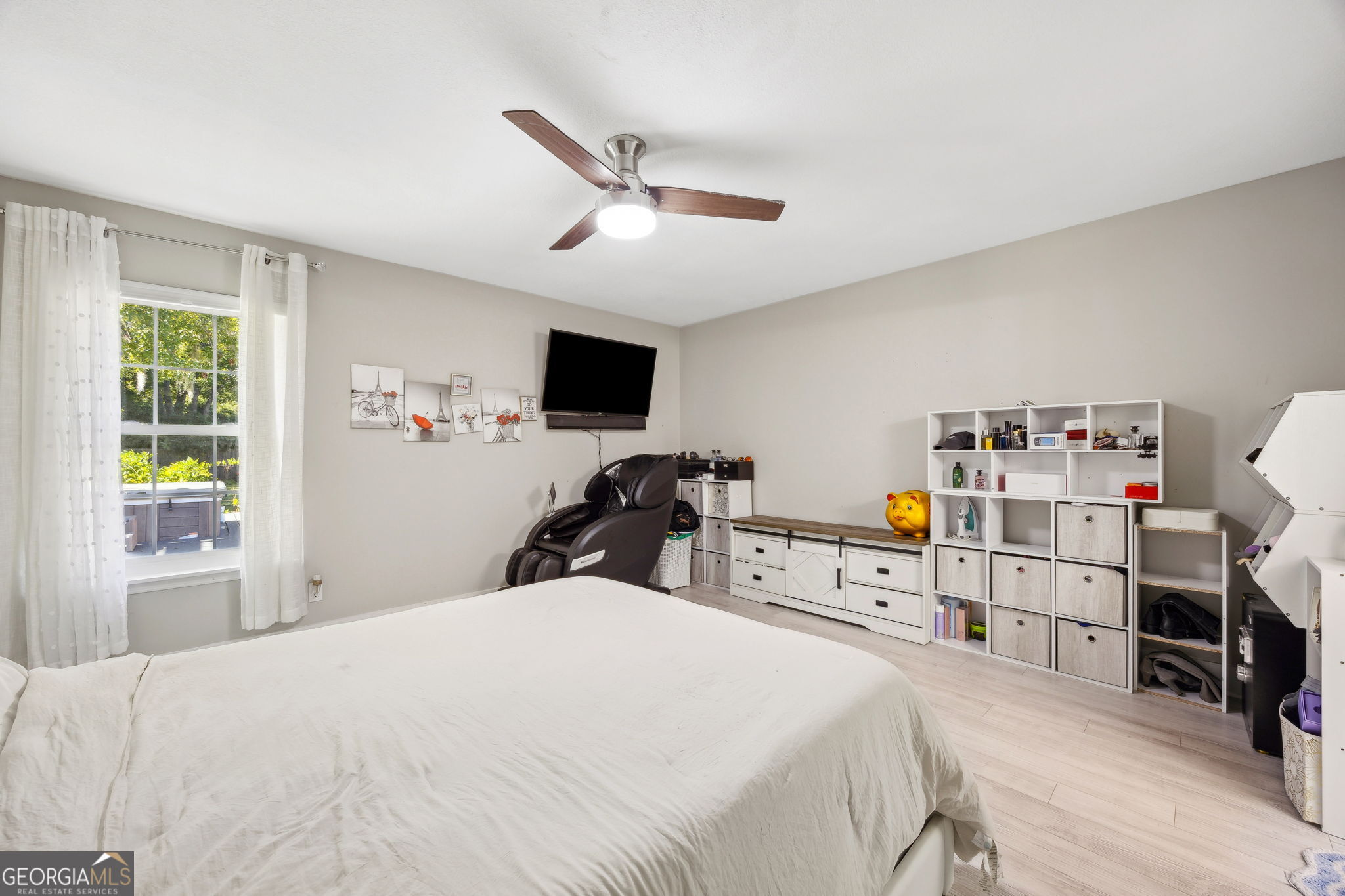 203 Foxwood Circle St. Marys, GA 31558 - Photo 18 of 52 a bedroom with a bed and a tv