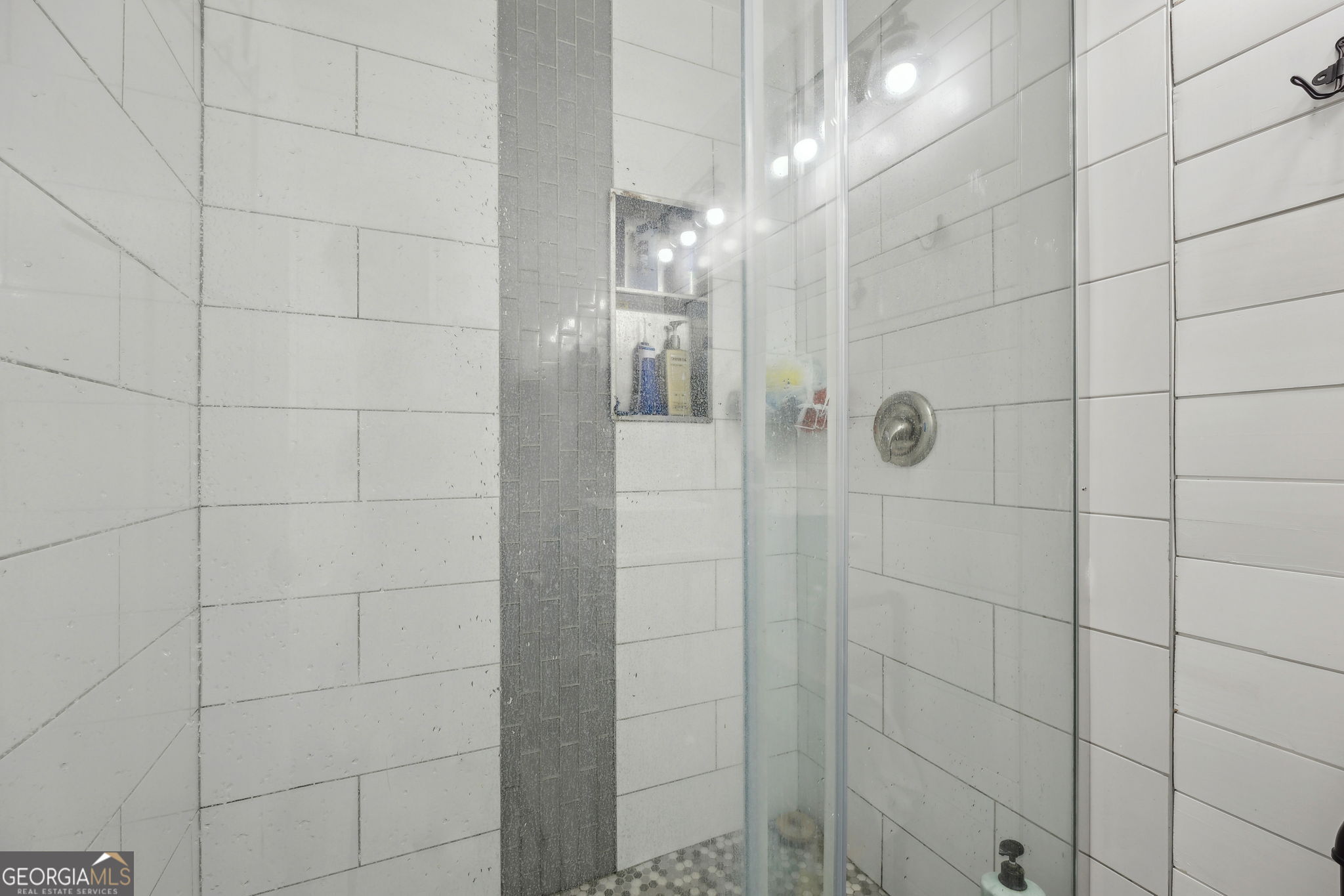 203 Foxwood Circle St. Marys, GA 31558 - Photo 21 of 52 a bathroom with a shower