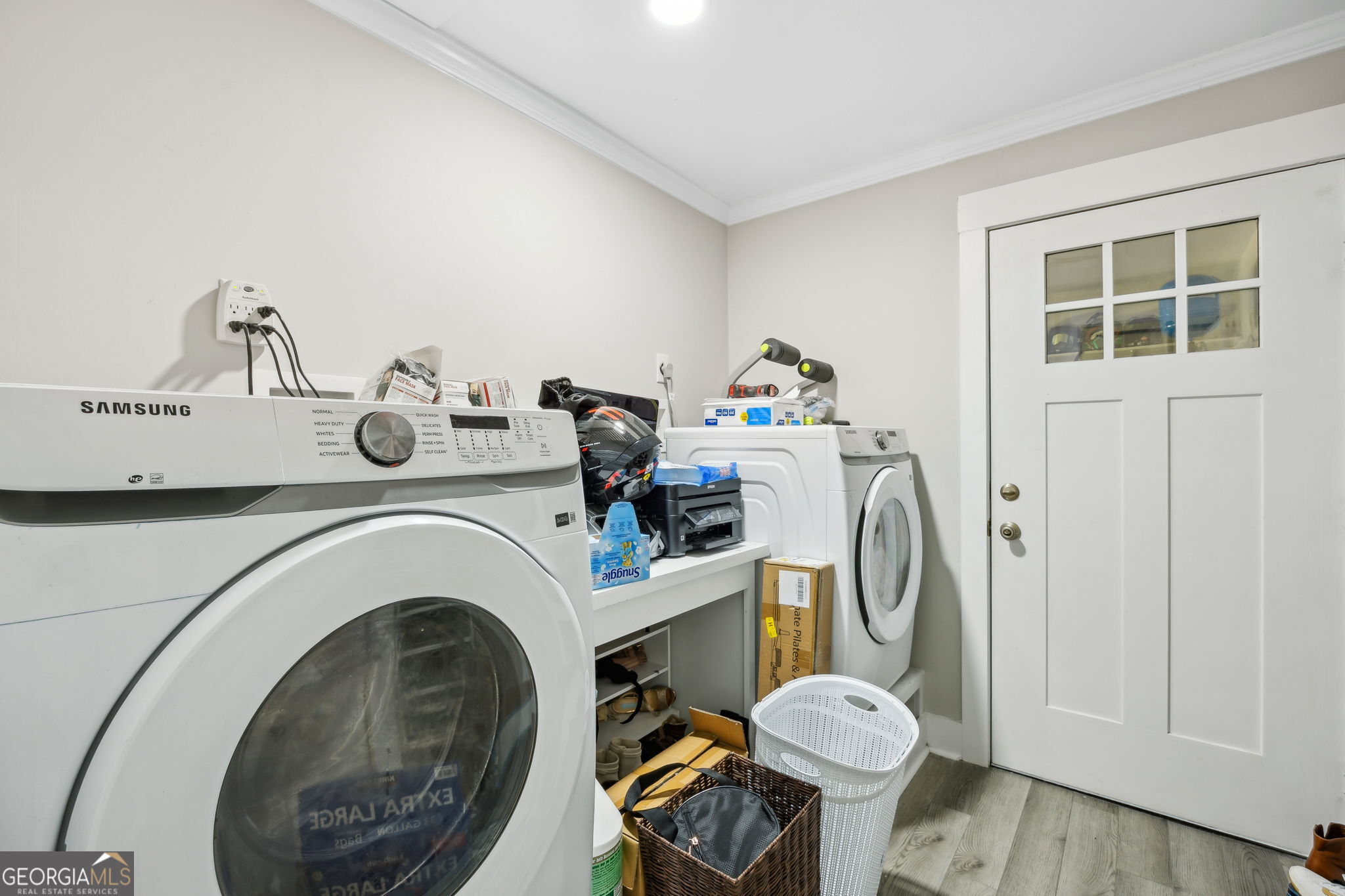 203 Foxwood Circle St. Marys, GA 31558 - Photo 28 of 52 a bathroom with a washer and dryer