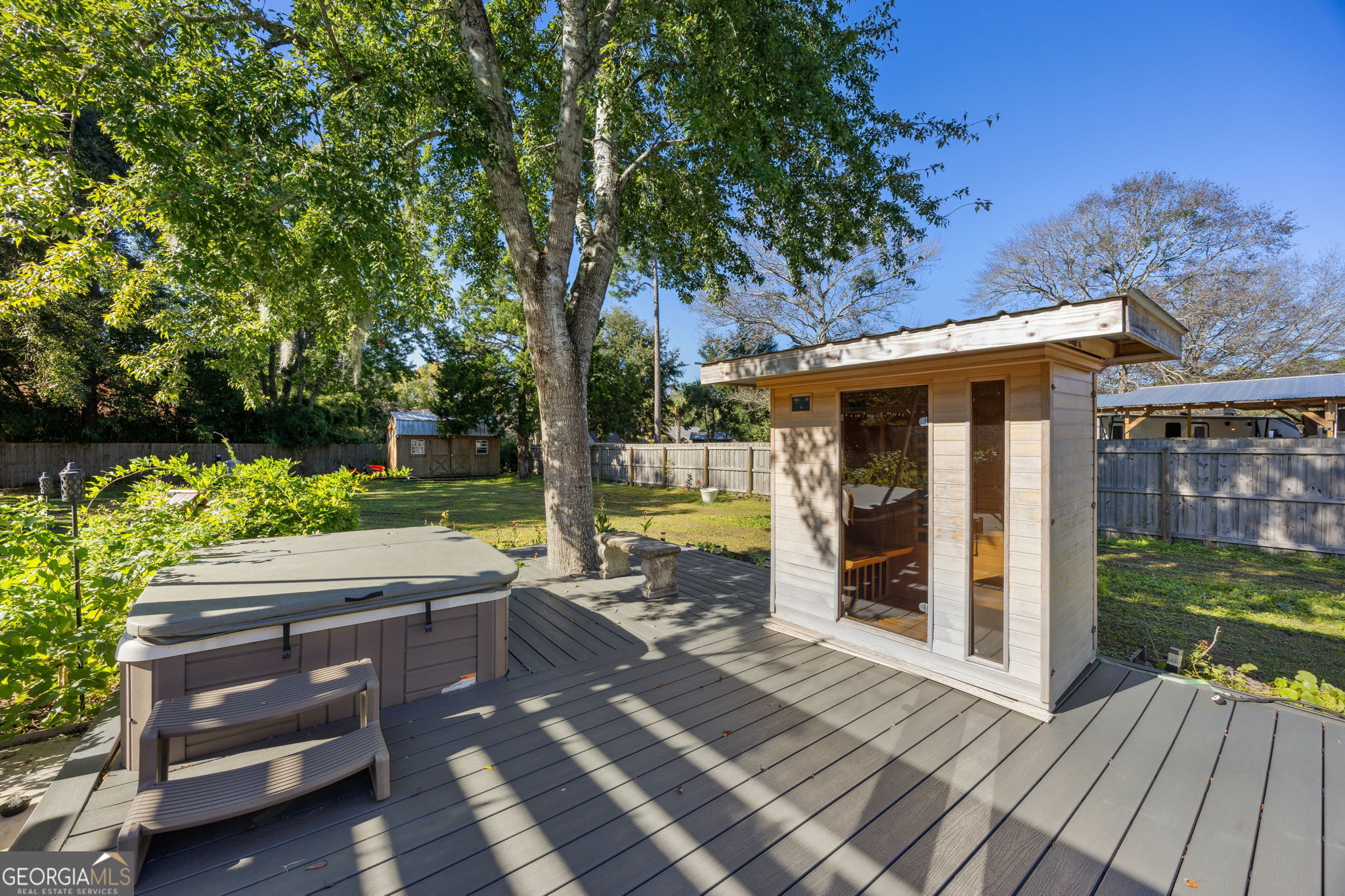 203 Foxwood Circle St. Marys, GA 31558 - Photo 32 of 52 a view of backyard with sitting area