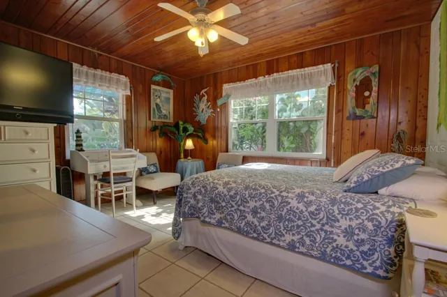 a bathroom with a toilet a sink and bathtub