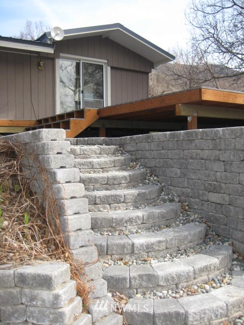 111 Frank Road Omak, WA 98841 - Photo 8 of 25 a front view of a house with a yard