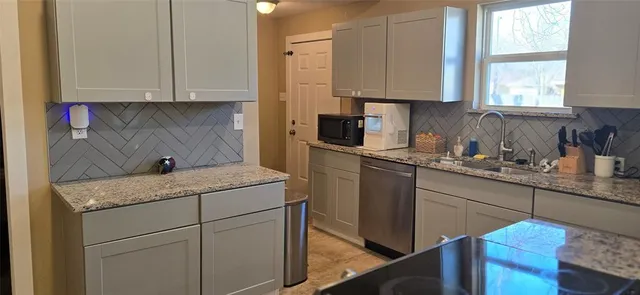 a room with furniture and a window