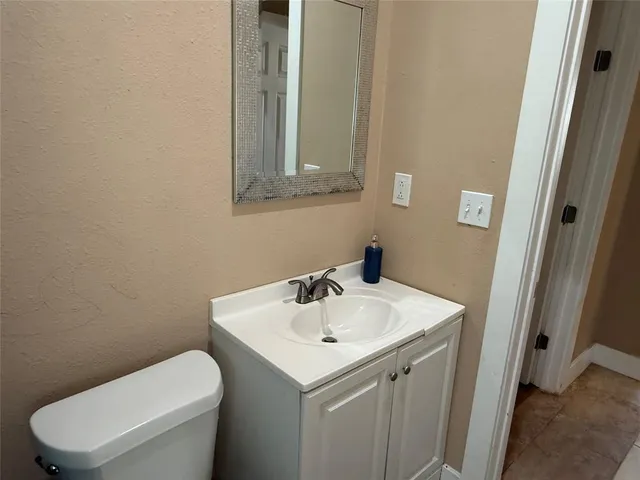 a bathroom with a sink and a toilet